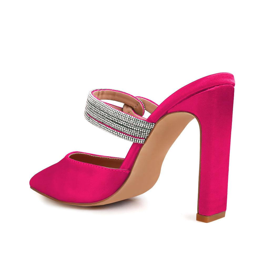 Fuchsia-colored upper women's pointed heels with rhinestone straps and slide on style-posterior view