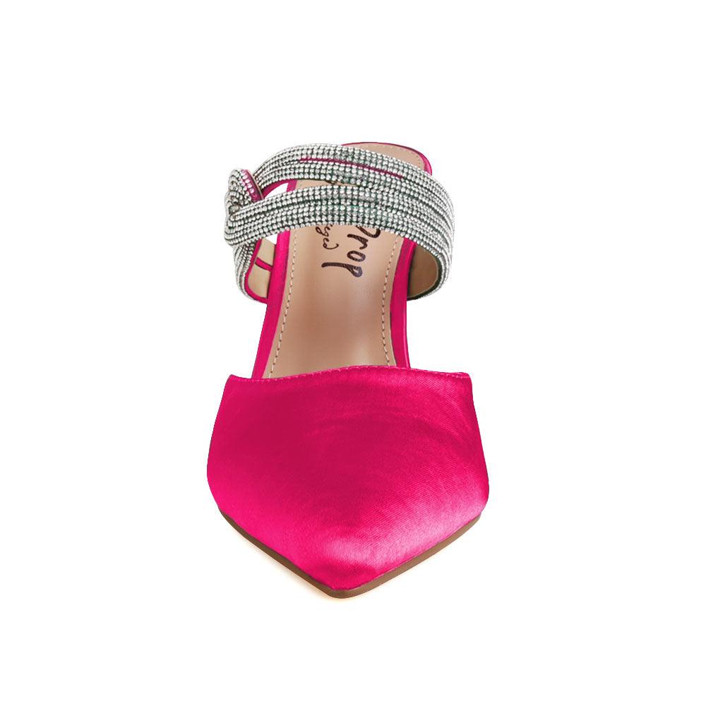 Fuchsia-colored upper women's pointed heels with rhinestone straps and slide on style-front view