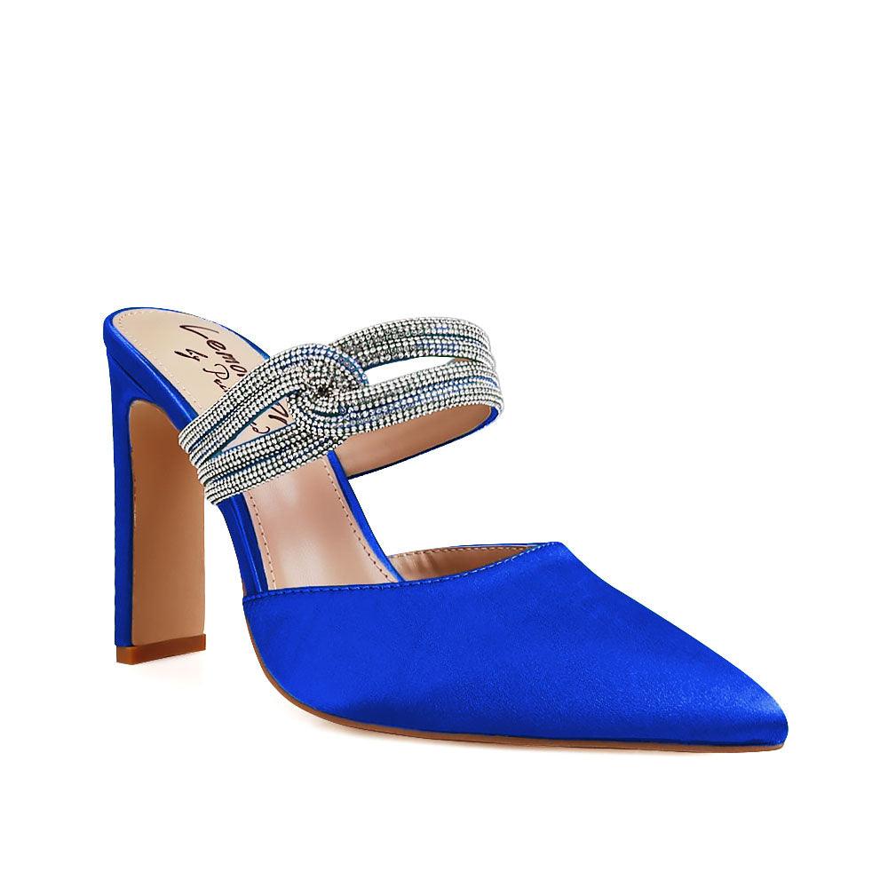 Women's pointed heels in cobalt-color with rhinestone straps and a slide on design-corner view