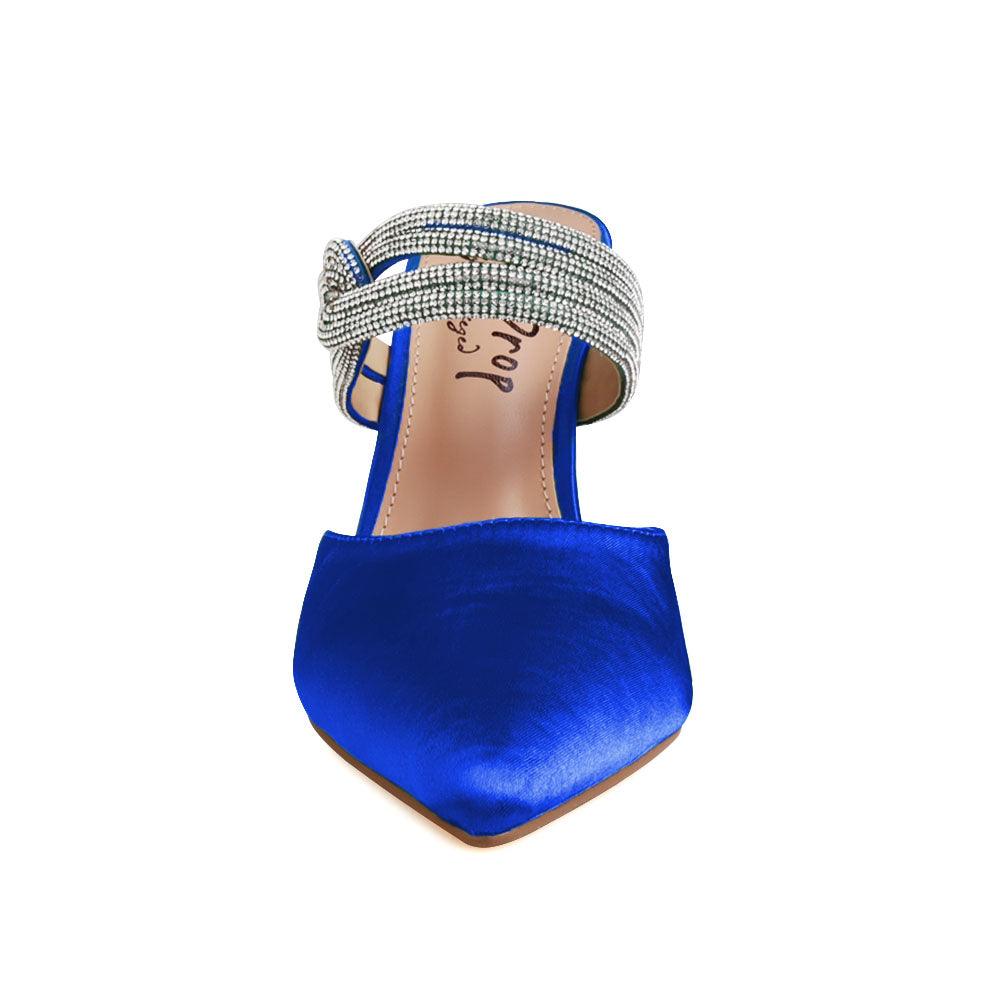 Women's pointed heels in cobalt-color with rhinestone straps and a slide on design-front view