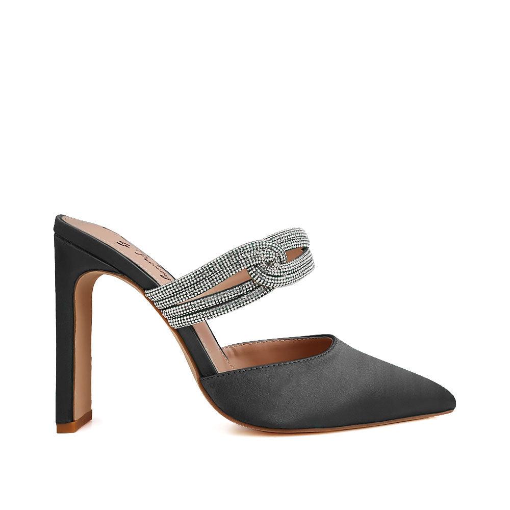 Women's black-colored pointed heels with rhinestone straps and slide on style-side view