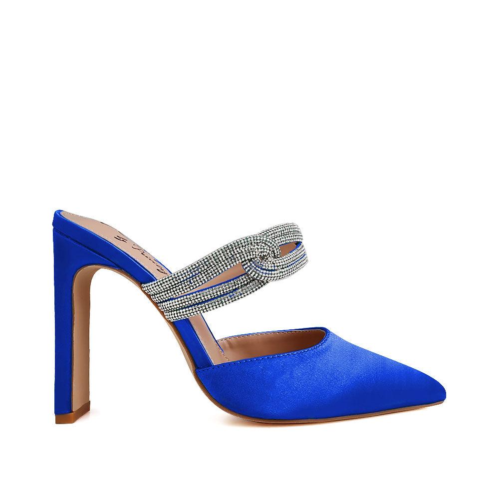 Women's pointed heels in cobalt-color with rhinestone straps and a slide on design-side view