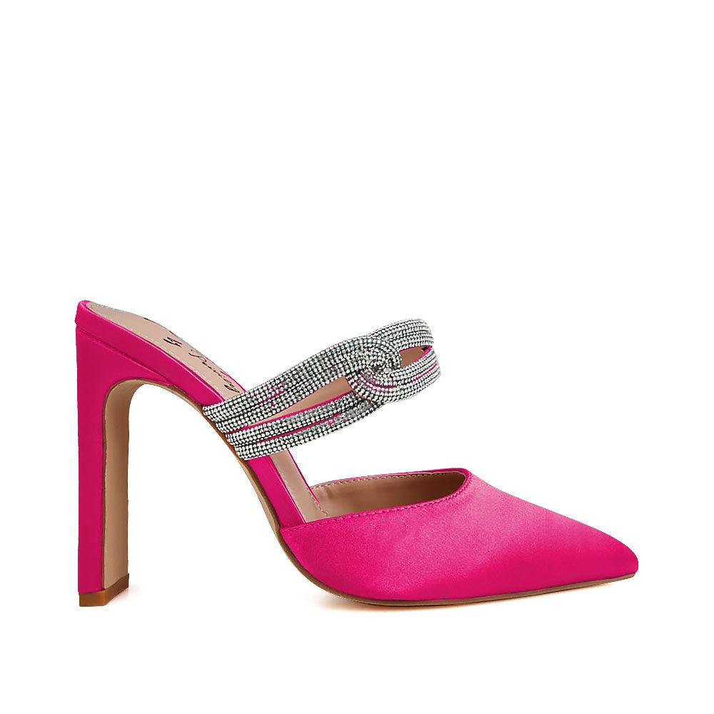 Fuchsia-colored upper women's pointed heels with rhinestone straps and slide on style-side view