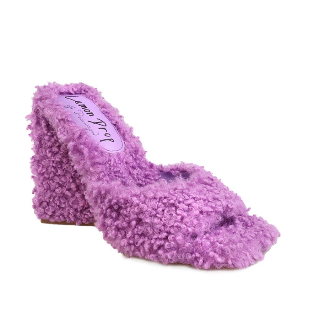 Women's open-toed purple-colored block heels with shearling top and slide-in style-corner view