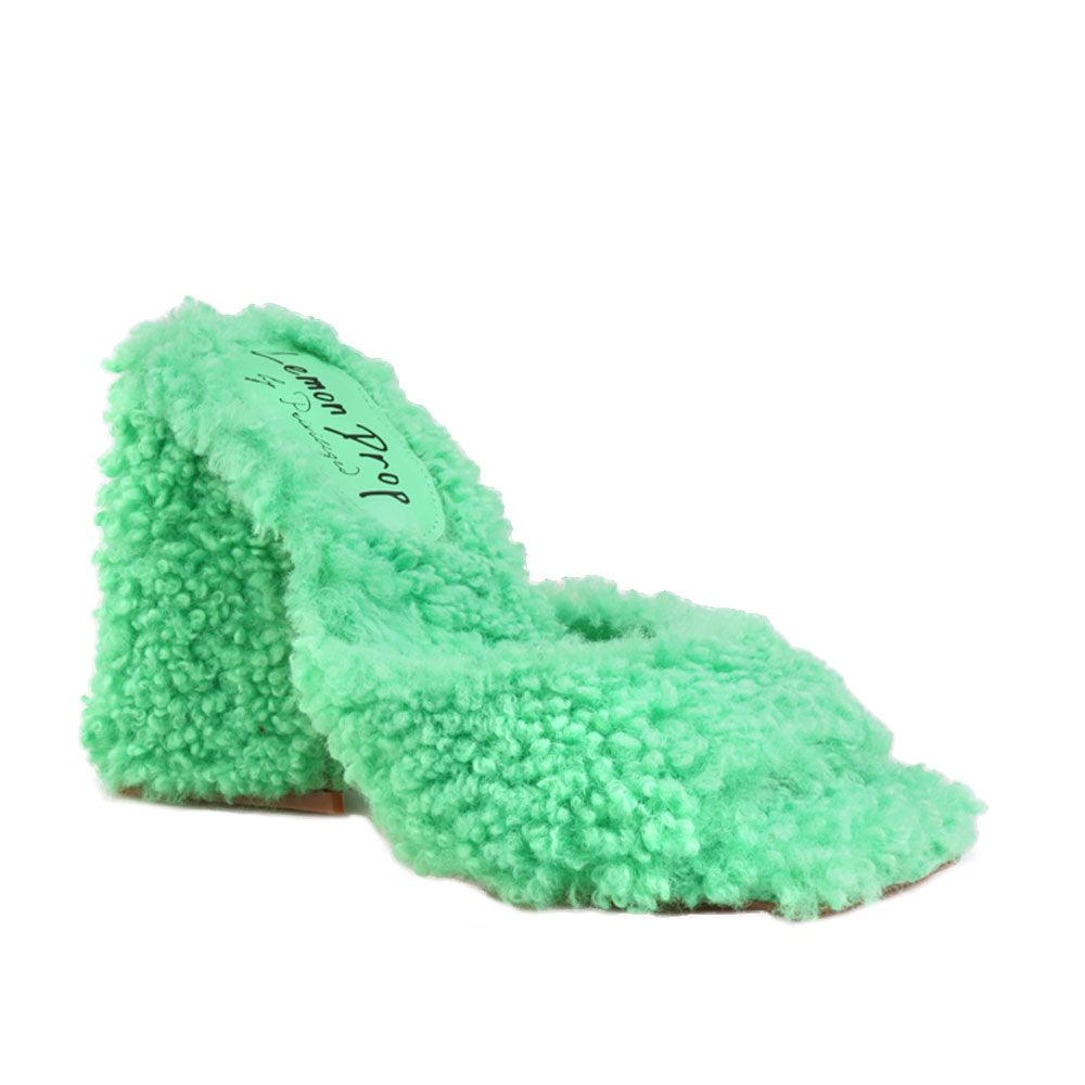 Open toed green-colored women's block heel shoes with shearling upper and slide in design-corner view