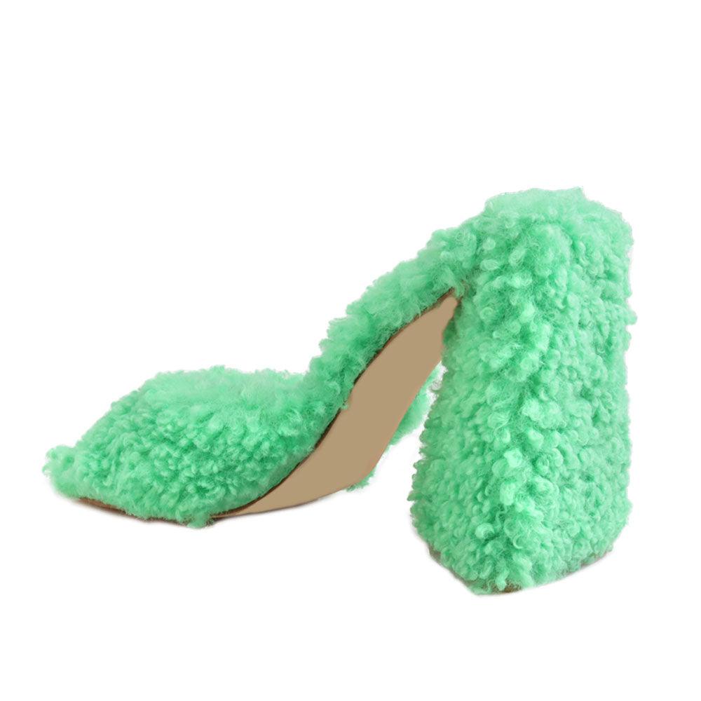 Open toed green-colored women's block heel shoes with shearling upper and slide in design-posterior view