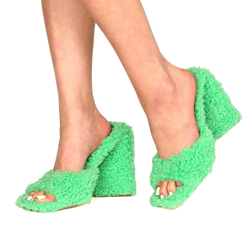 Open toed green-colored women's block heel shoes with shearling upper and slide in design