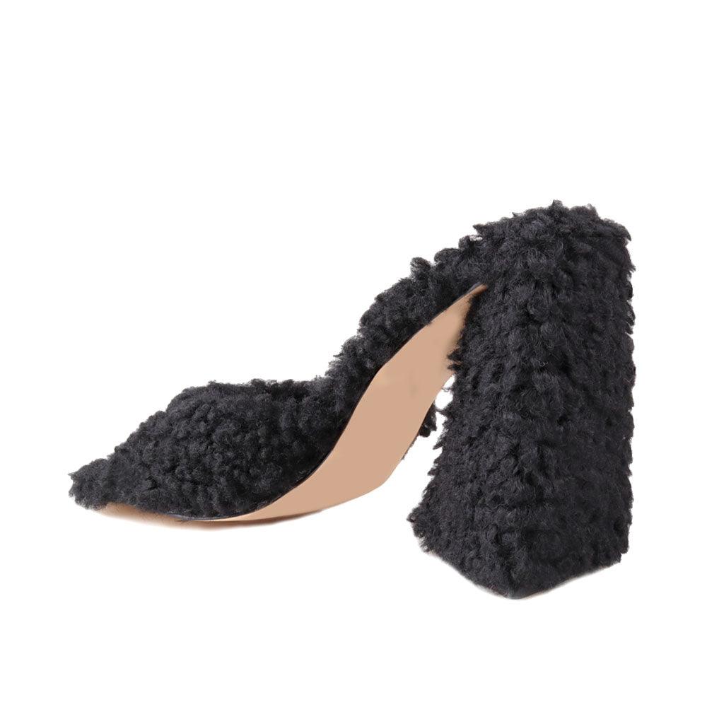 Women's open-toed black-colored block heels with shearling top and slide-in design-posterior view