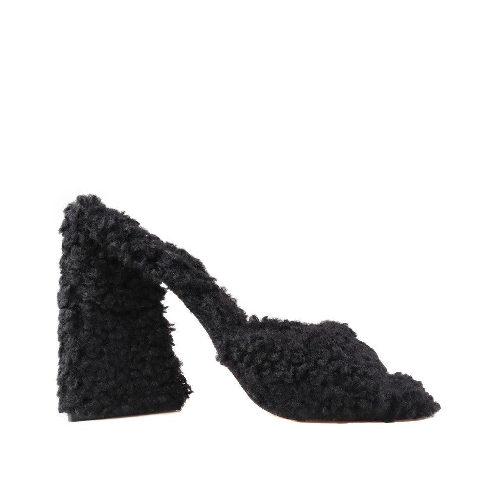 Women's open-toed black-colored block heels with shearling top and slide-in design-side view