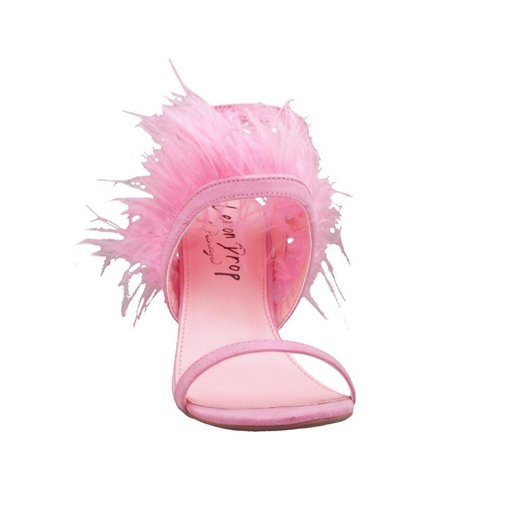 Pink colored women heels with fur on top-front view