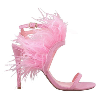 Pink colored women heels with fur on top-side view