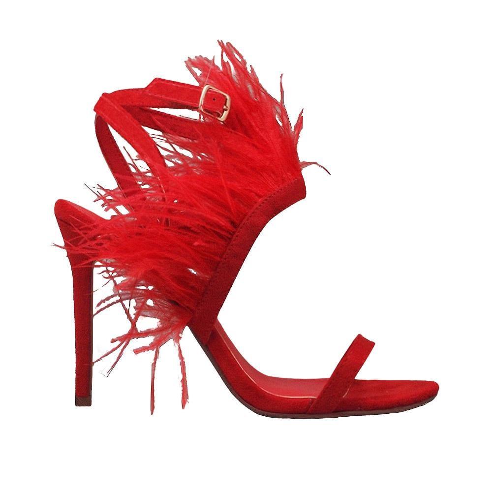 Red colored women heels with fur on top-side view