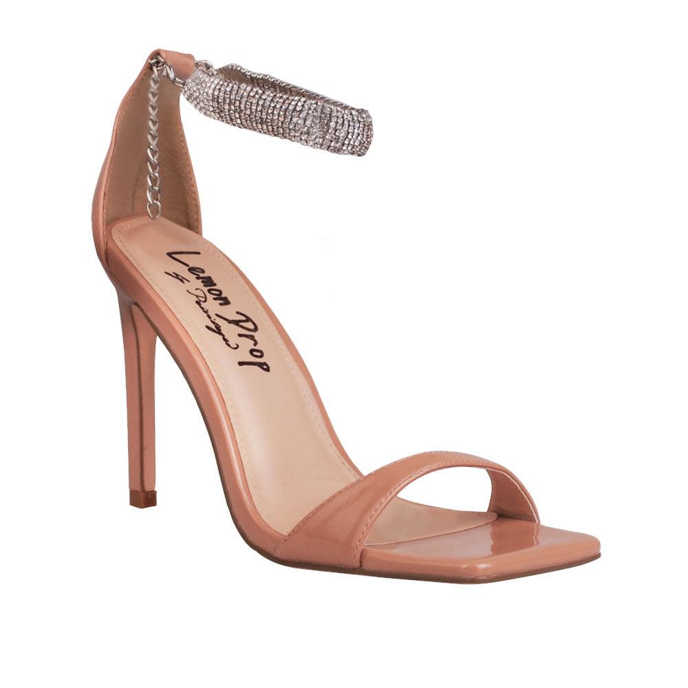 Nude colored women heels with silver ankle buckle-corner view