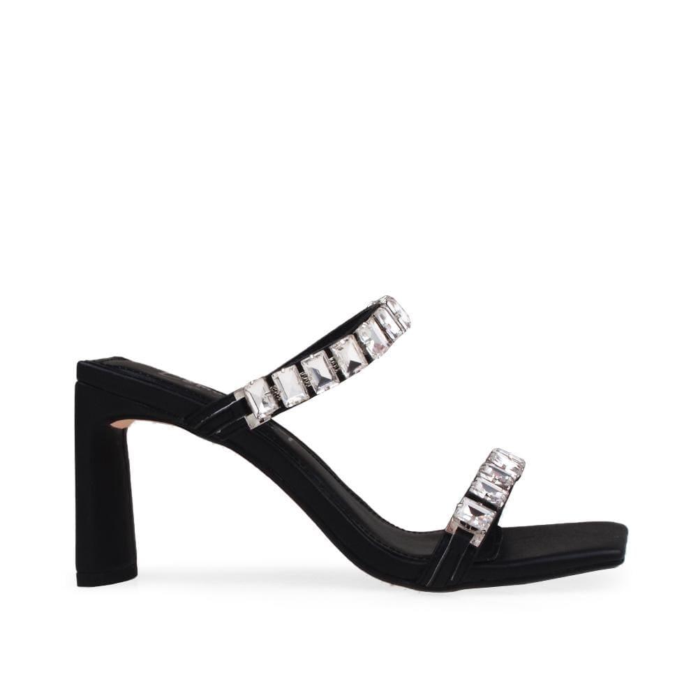 Black colored women heels with silver embellished straps