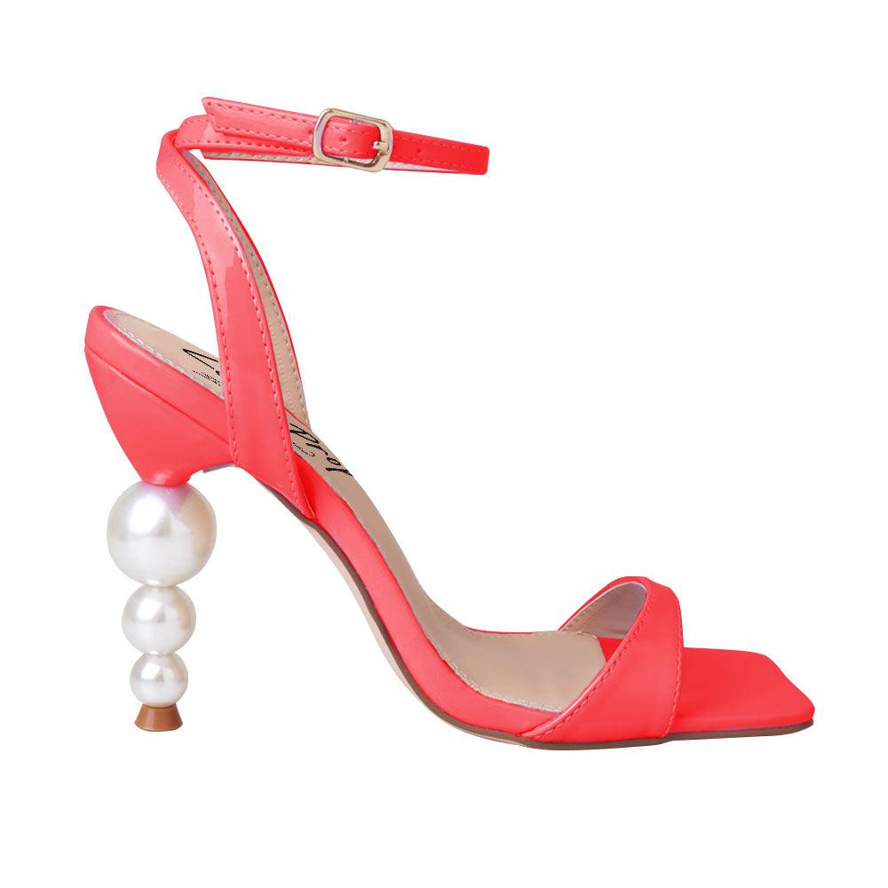 Red colored women heels with ankle buckle closure and three tiered pearl heel-side view