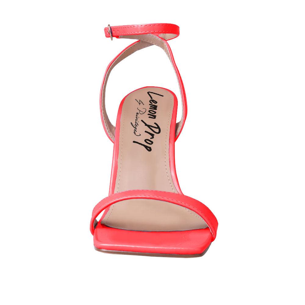 Red colored women heels with ankle buckle closure and three tiered pearl heel-front view