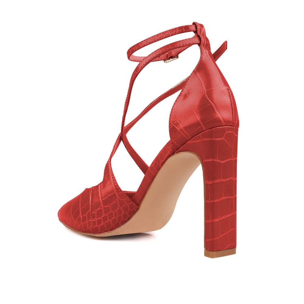 Red colored women heel with two ankle buckles-posterior view