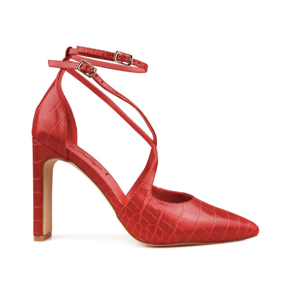 Red colored women heel with two ankle buckles-side view