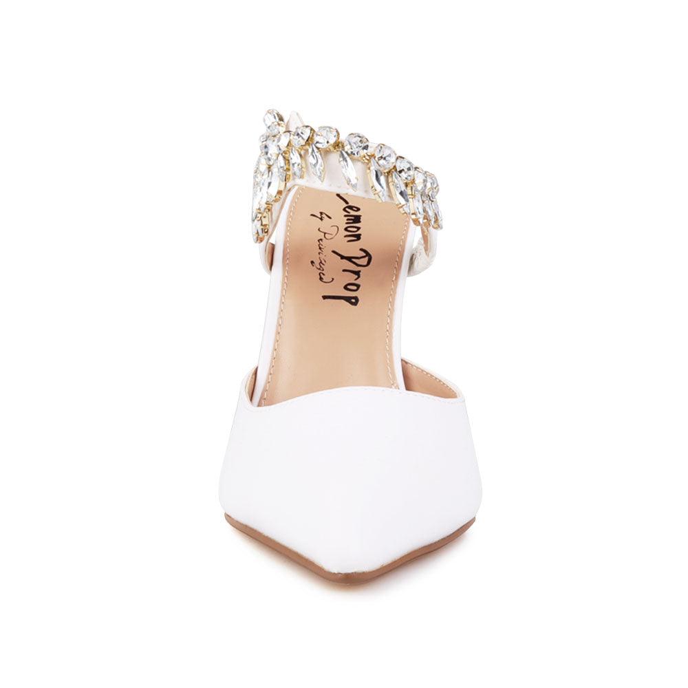 White colored women heels with slip-on desgin and a silver motive strap-front view