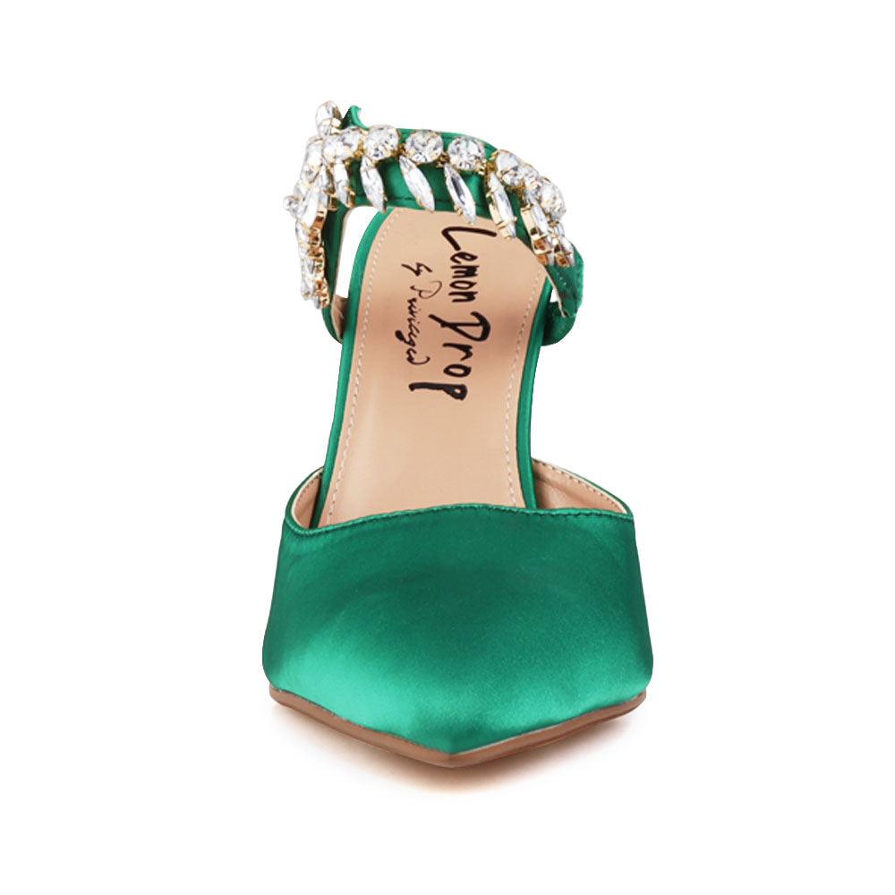 Green colored women heels with slip-on desgin and a silver motive strap-front view