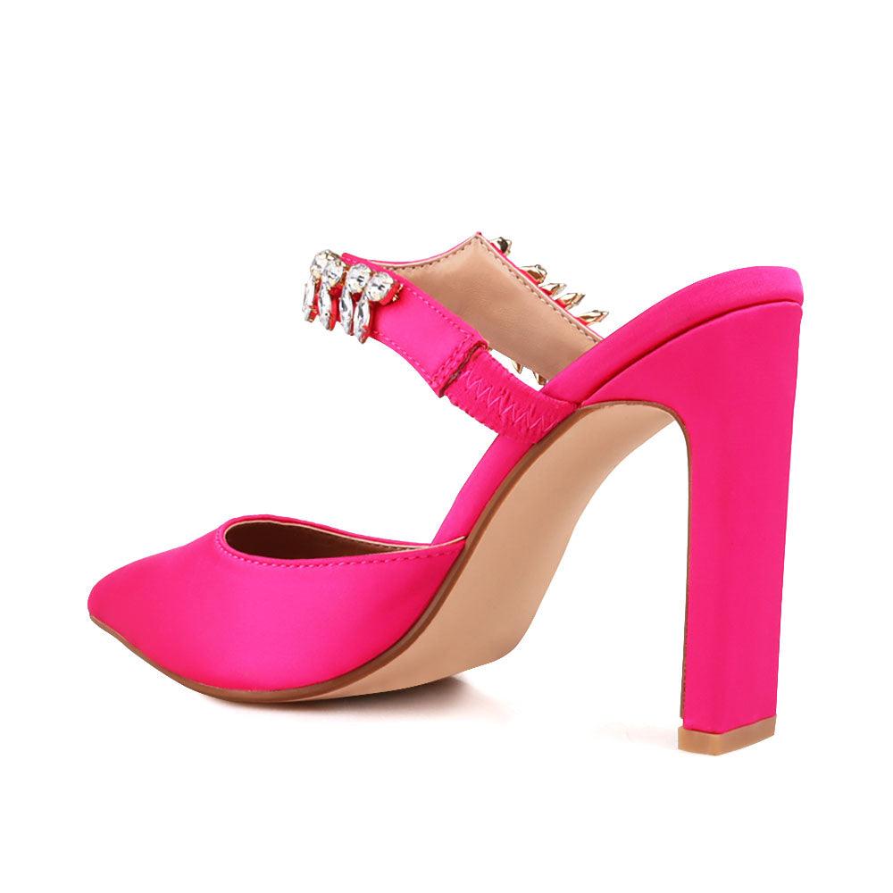 Pink colored women heels with slip-on desgin and a silver motive strap-posterior view