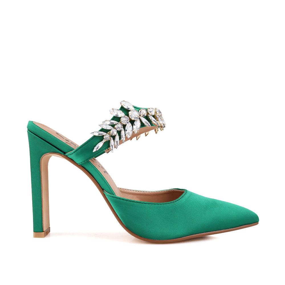 Green colored women heels with slip-on desgin and a silver motive strap-side view