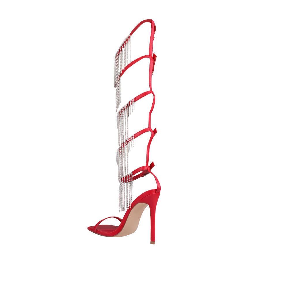 Red women high heels with five buckles-posterior view