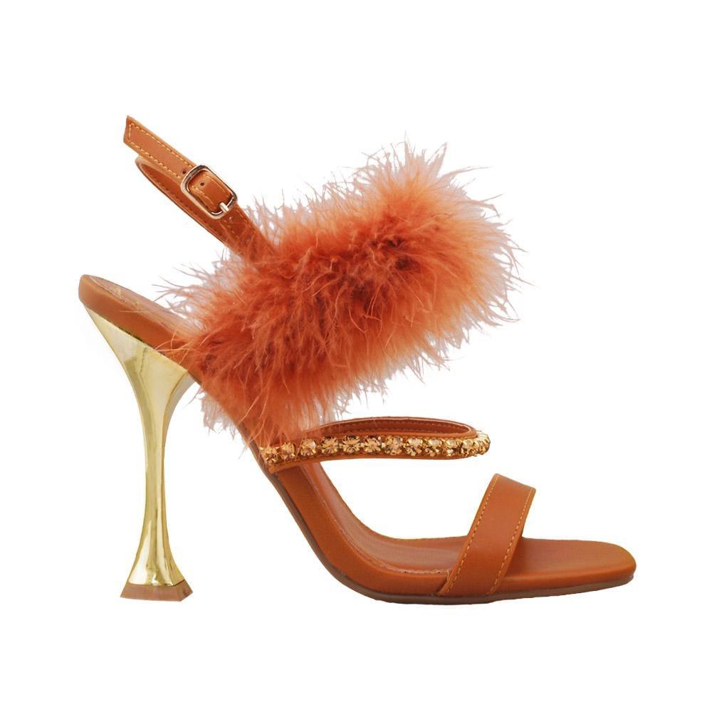 Tan colored women heels with white heel and fur ankle buckle closure