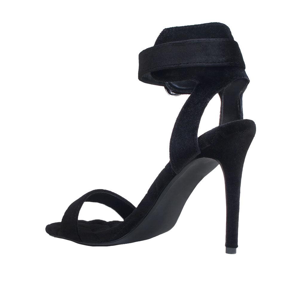 Black velvet women heels with silver ankle buckle closure-posterior view