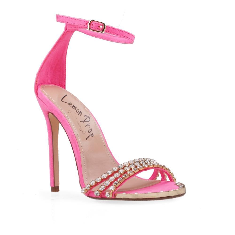 Pink women heels with ankle buckle and golden toe-corner view