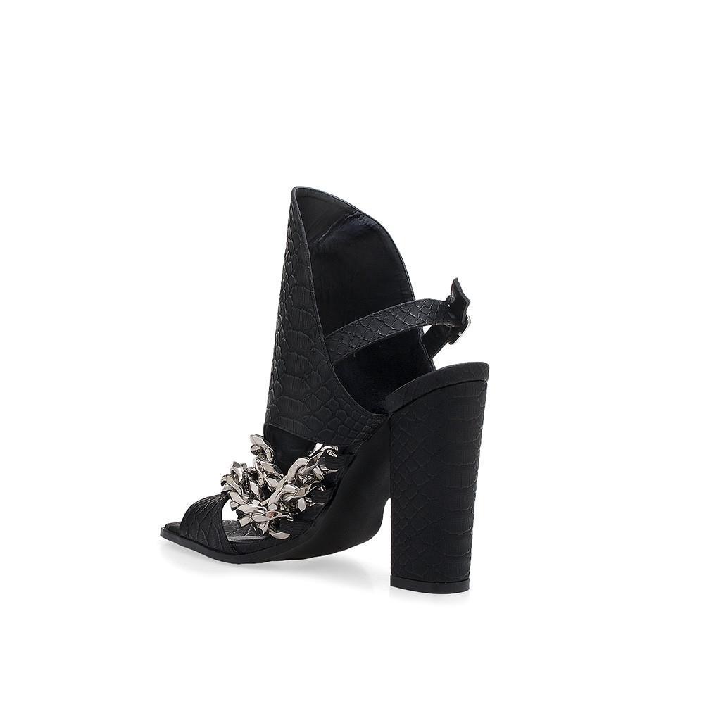 Black women heels with silver chain on upper and block heel-posterior view