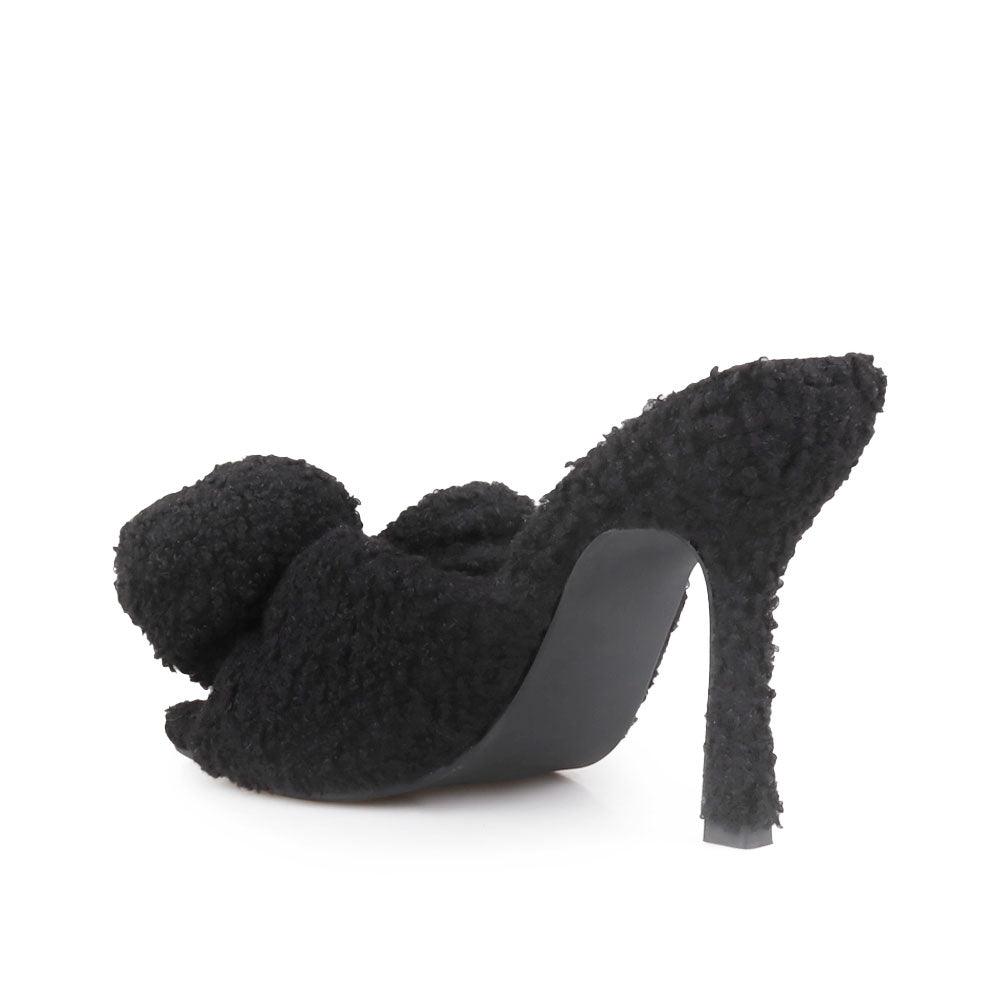 Black women heels made with vegan shearling-posterior view