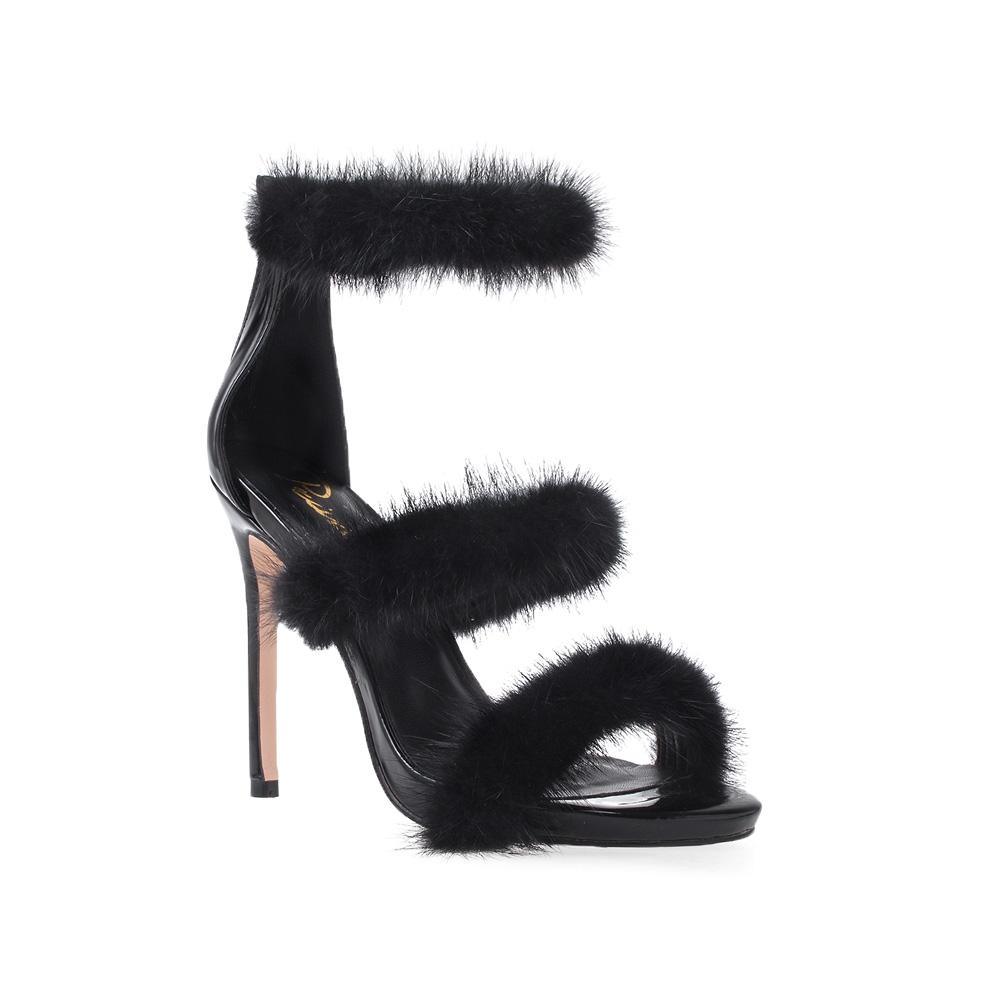 Vegan leather women's heel with fur in black-corner view