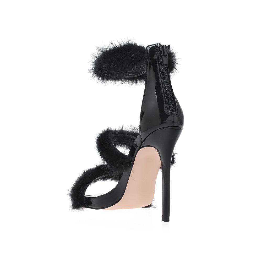 Vegan leather women's heel with fur in black-posterior view