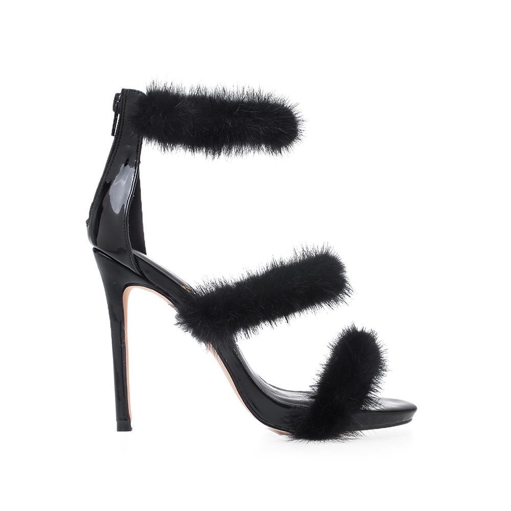 Vegan leather women's heel with fur in black-side view