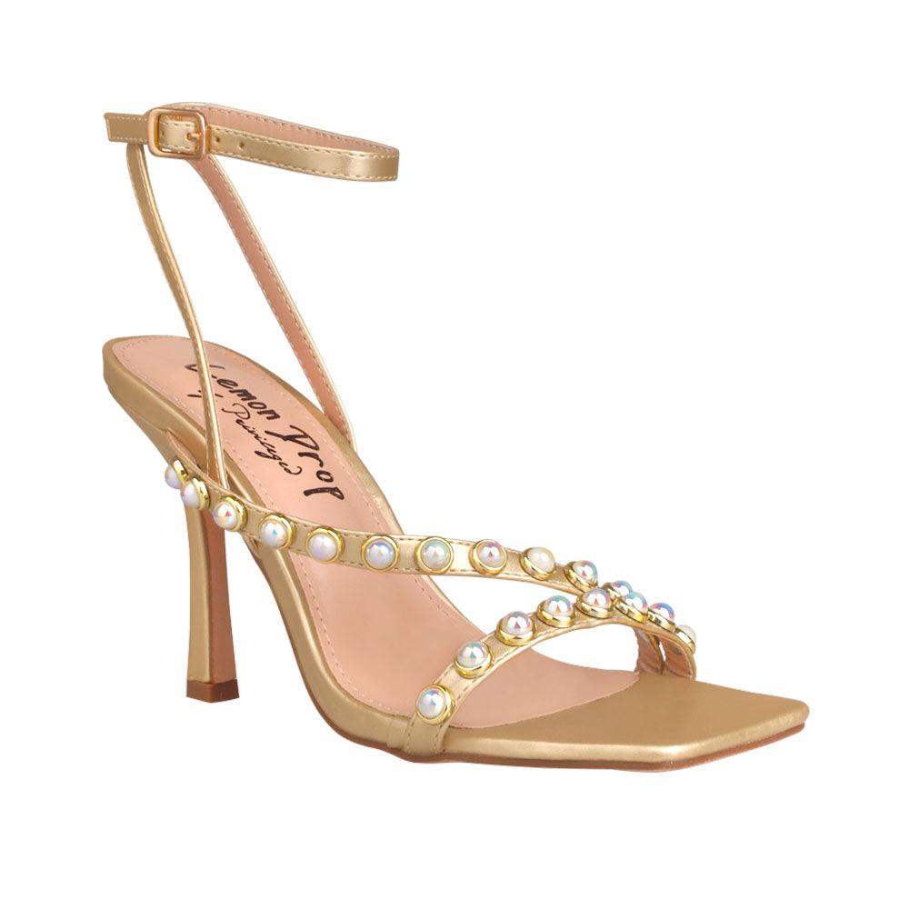 Women heels in gold with pearls-corner view