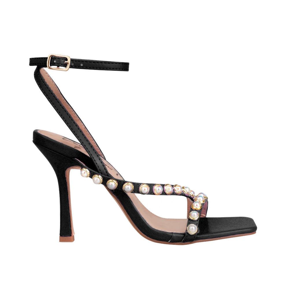 Women heels in black with pearls-side view