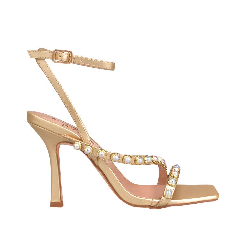 Women heels in gold with pearls-side view