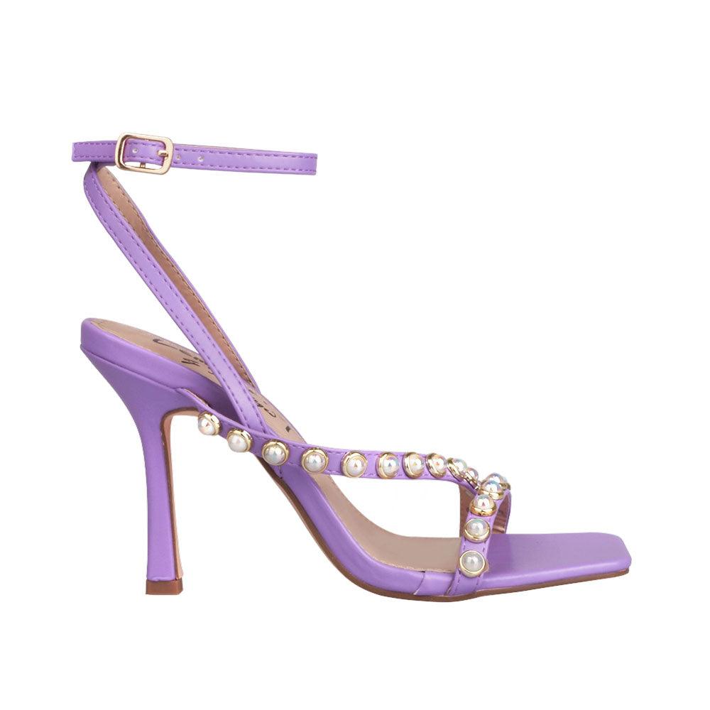 Women heels in purple with pearls-side view