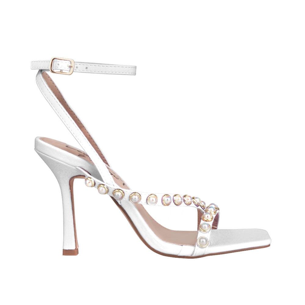 Women heels in white with pearls-side view