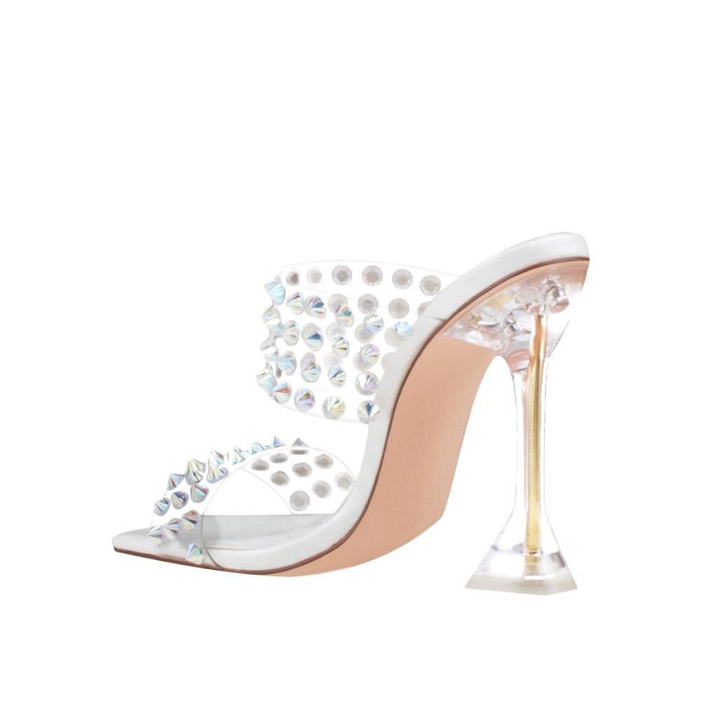 Clear vinyl upper with studs women stiletto heels in white-posterior view