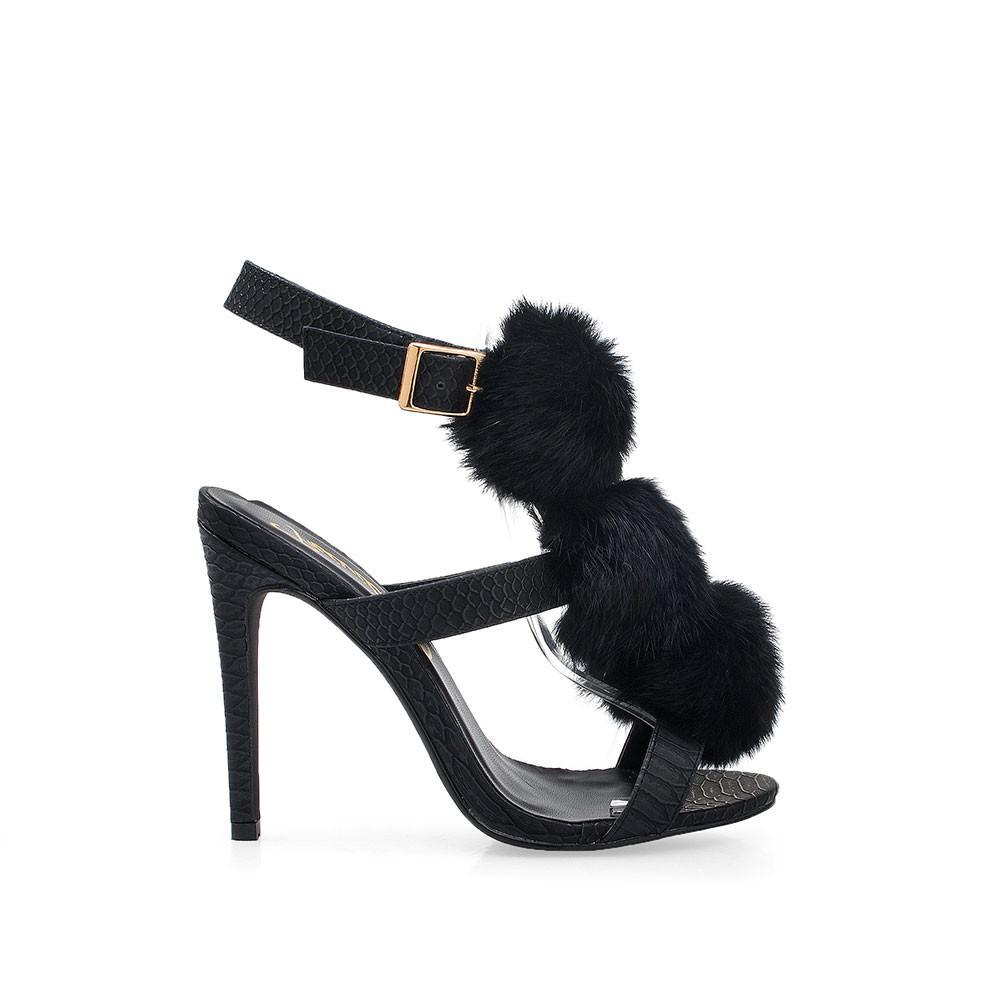 Black leather heels with furry upper and ankle buckle closure