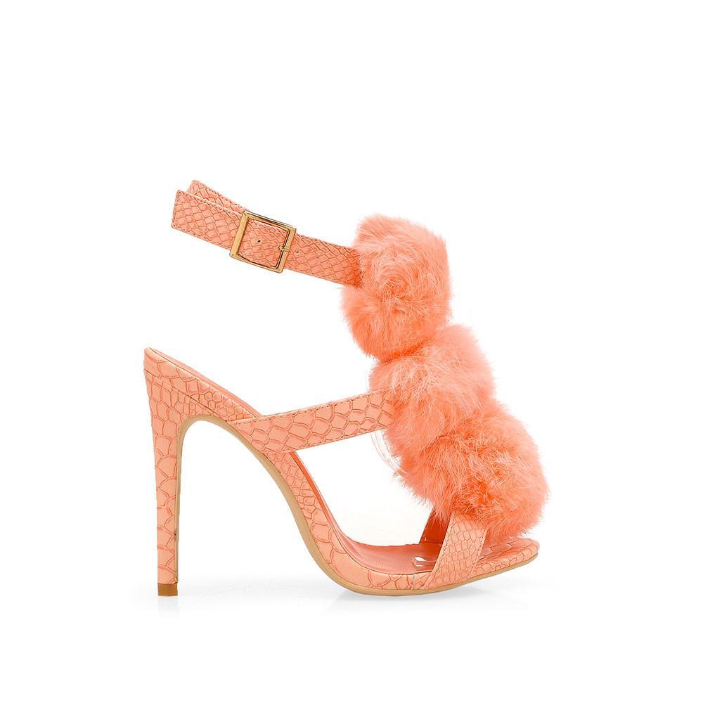 Coral leather heels with a furry upper and an ankle buckle clasp