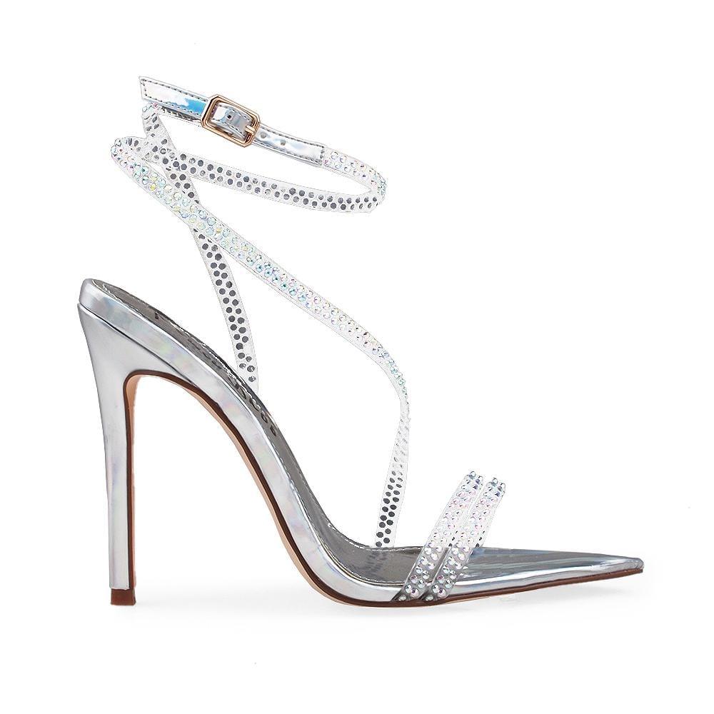 Silver shoes with crystal adorned top and an ankle buckle fastening