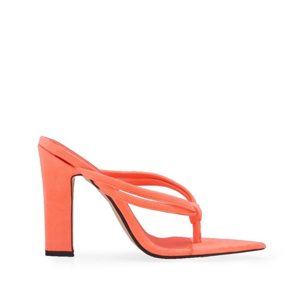 Coral colored pointed toe heels with slip-on deisgn