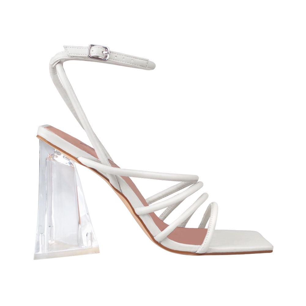 White transparent heels with strappy sandals style and ankle buck closure