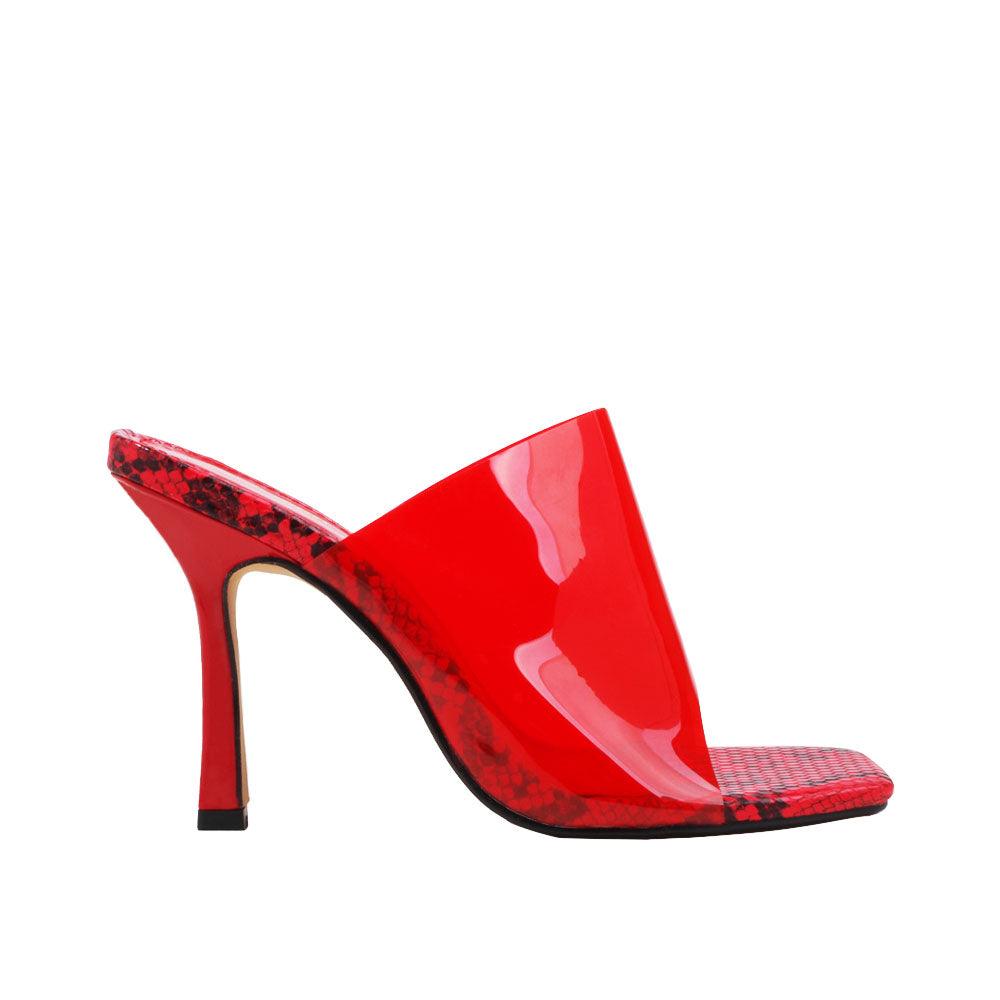 Women's red colored open-toed heels with a transparent upper