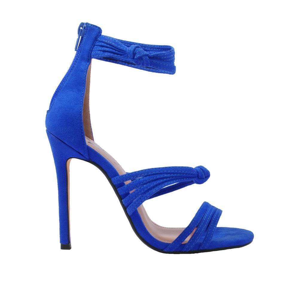 Blue heels with tie straps pattern and zip closure at the back.