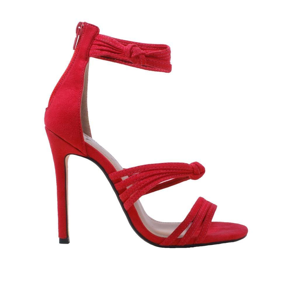 Red shoes with tie strap style and rear zip fastening.