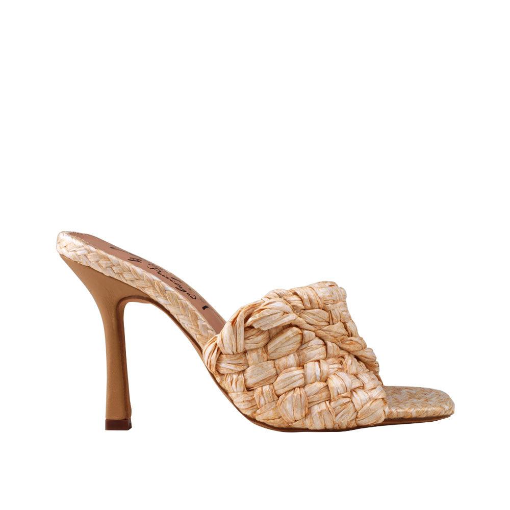 Women's natural colored heels with patterned mule and slip-on style.